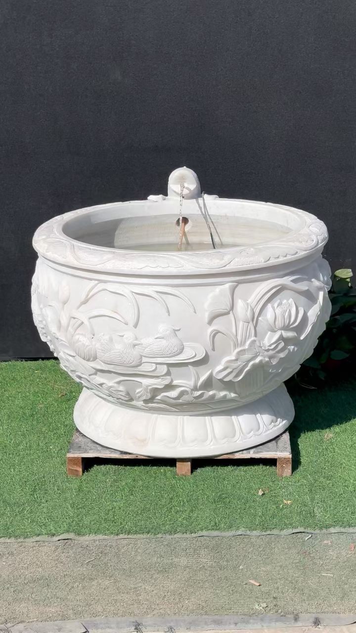 一级汉白玉荷花鱼流水石缸一件石质洁白无瑕透光透亮一圈浮雕荷花鱼图案高浮雕工艺