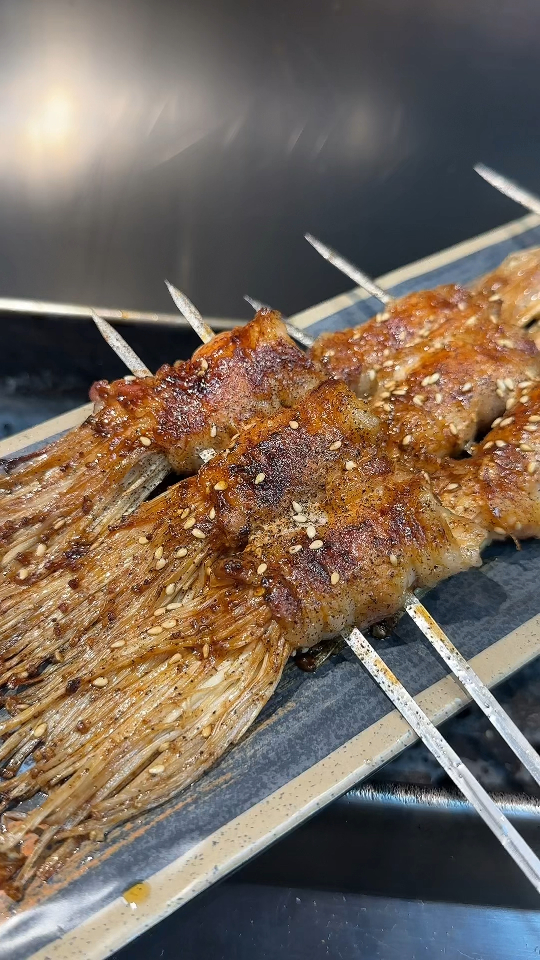 黑椒味的五花肉卷金针菇