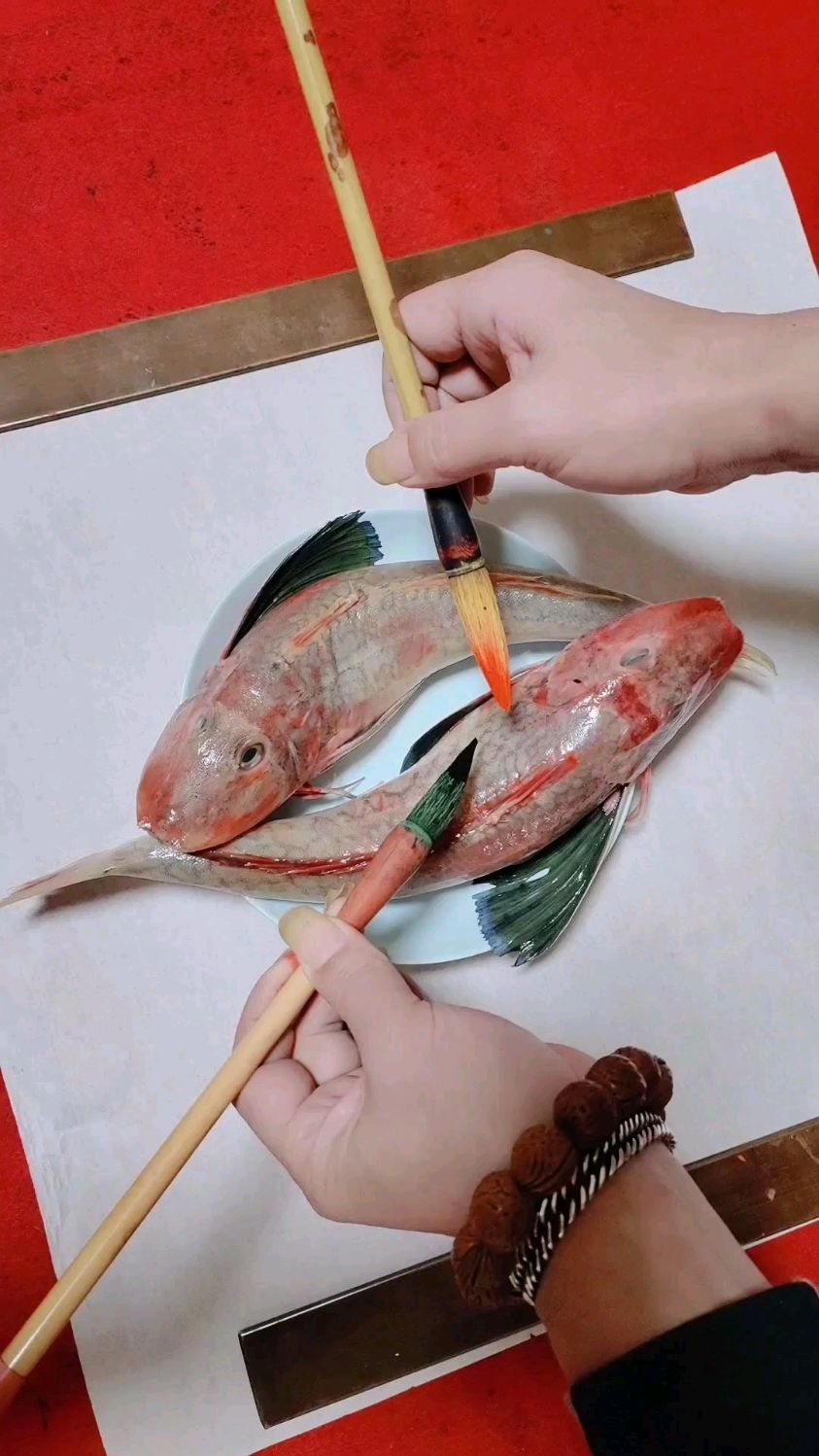 画鱼,寓意年年有余