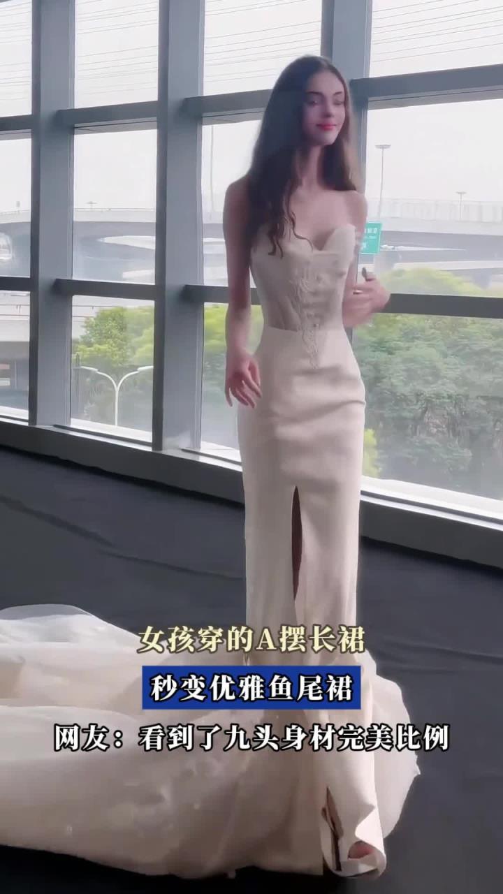 女孩穿的A摆长裙,秒变优雅鱼尾裙