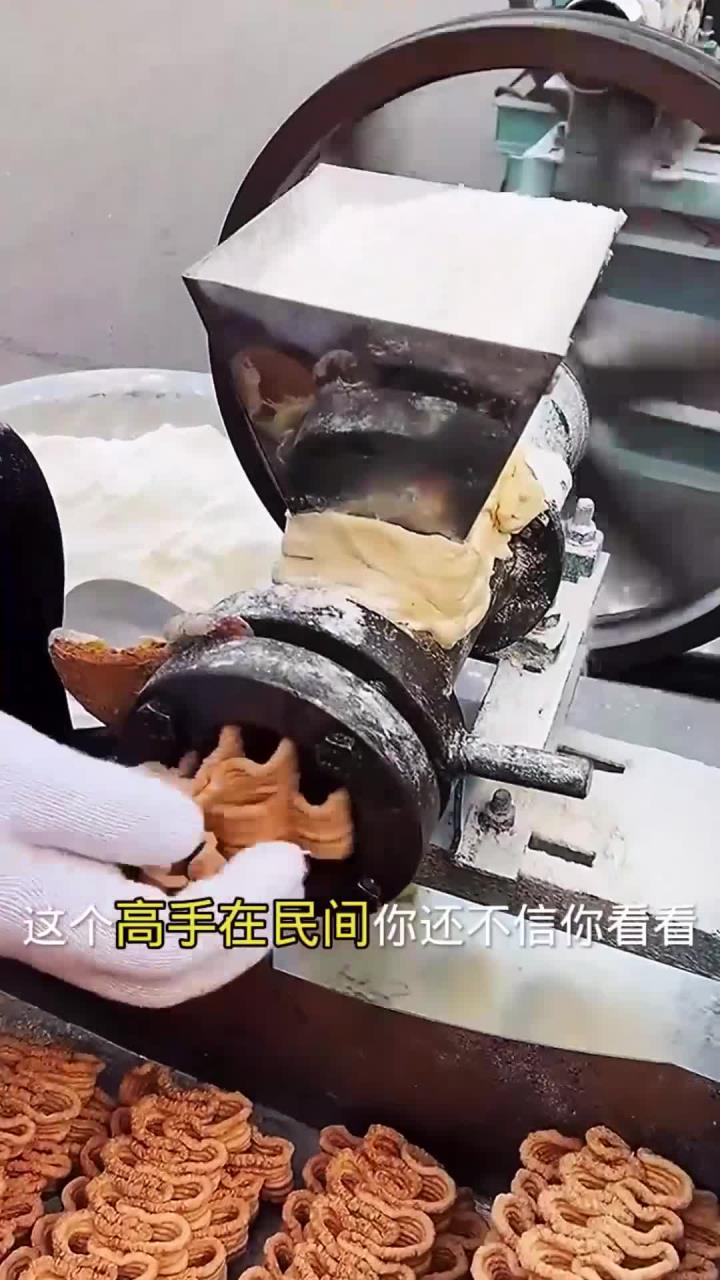 高手在民间,研究的爆米花机器