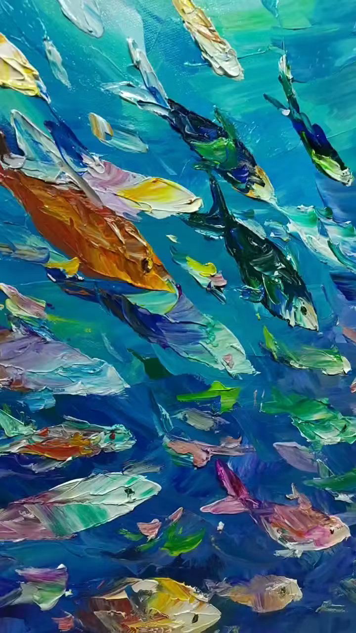 画一幅漂亮的鱼儿游泳