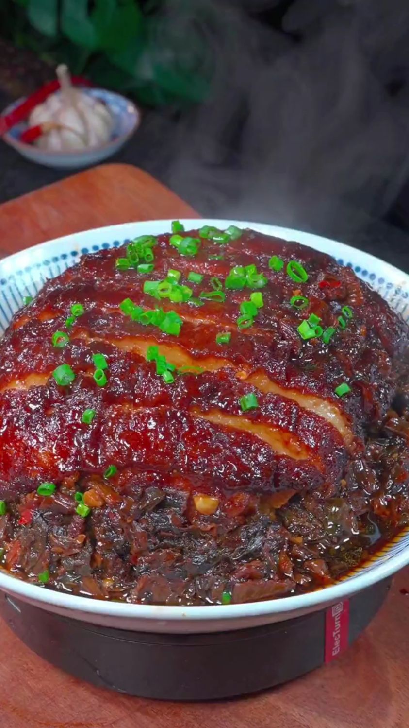 来看看广西扣肉是怎么制作吧