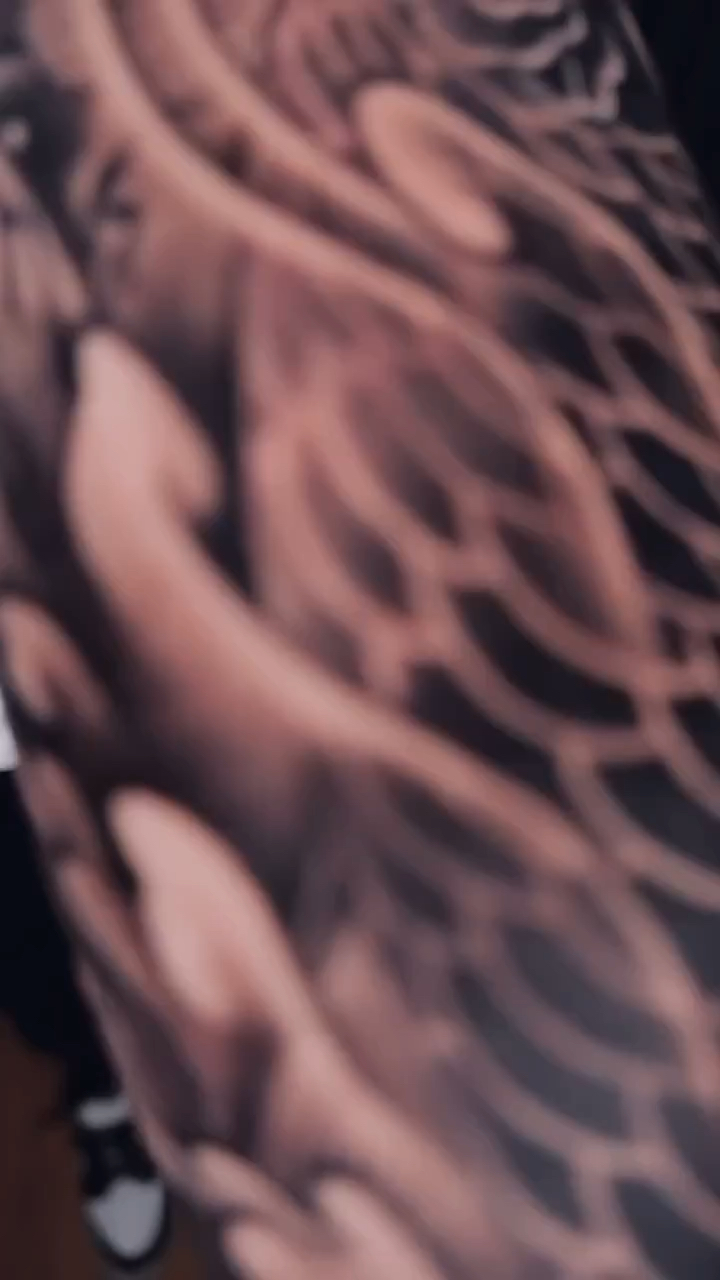 北京纹身/男生手臂鲤鱼衔接花臂纹身