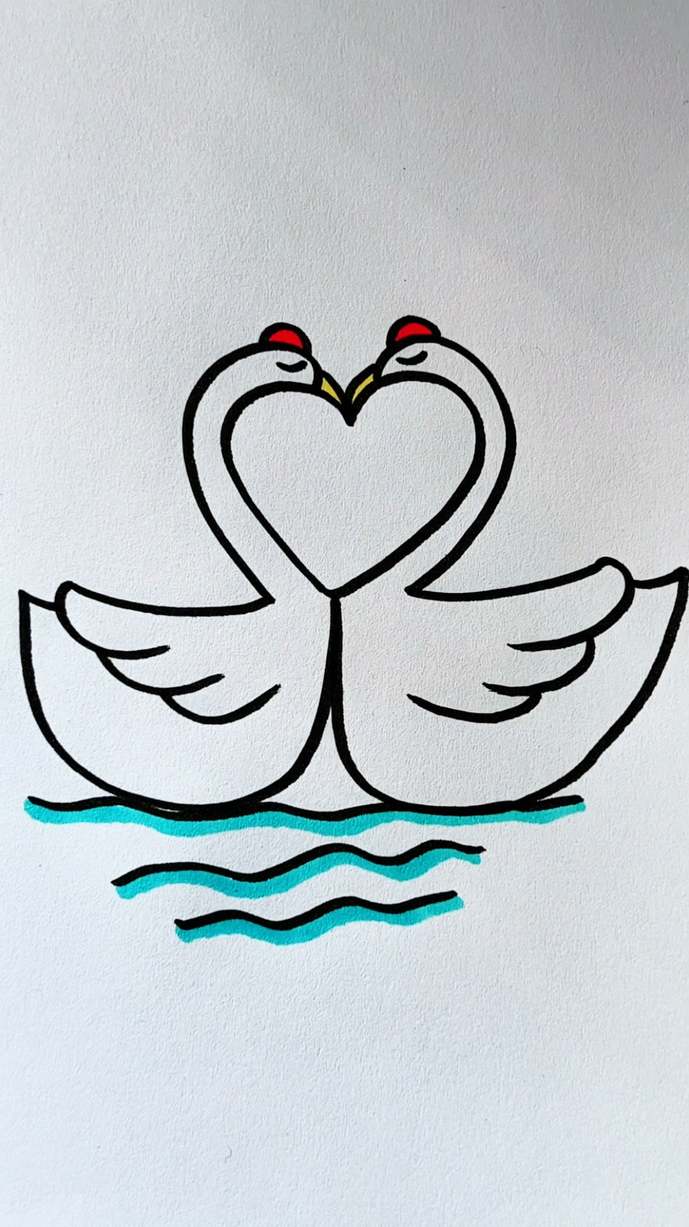 用爱心画两只大白鹅