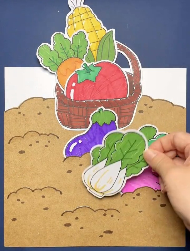 田里的蔬菜丰收啦,孩子喜欢的创意手工画