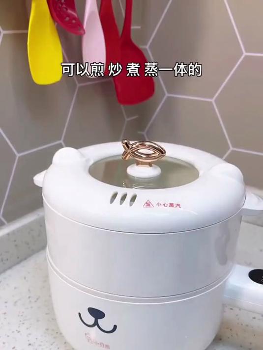 这款小贝熊辅食锅是陶瓷釉的,不粘材质,可预约温控的多功能