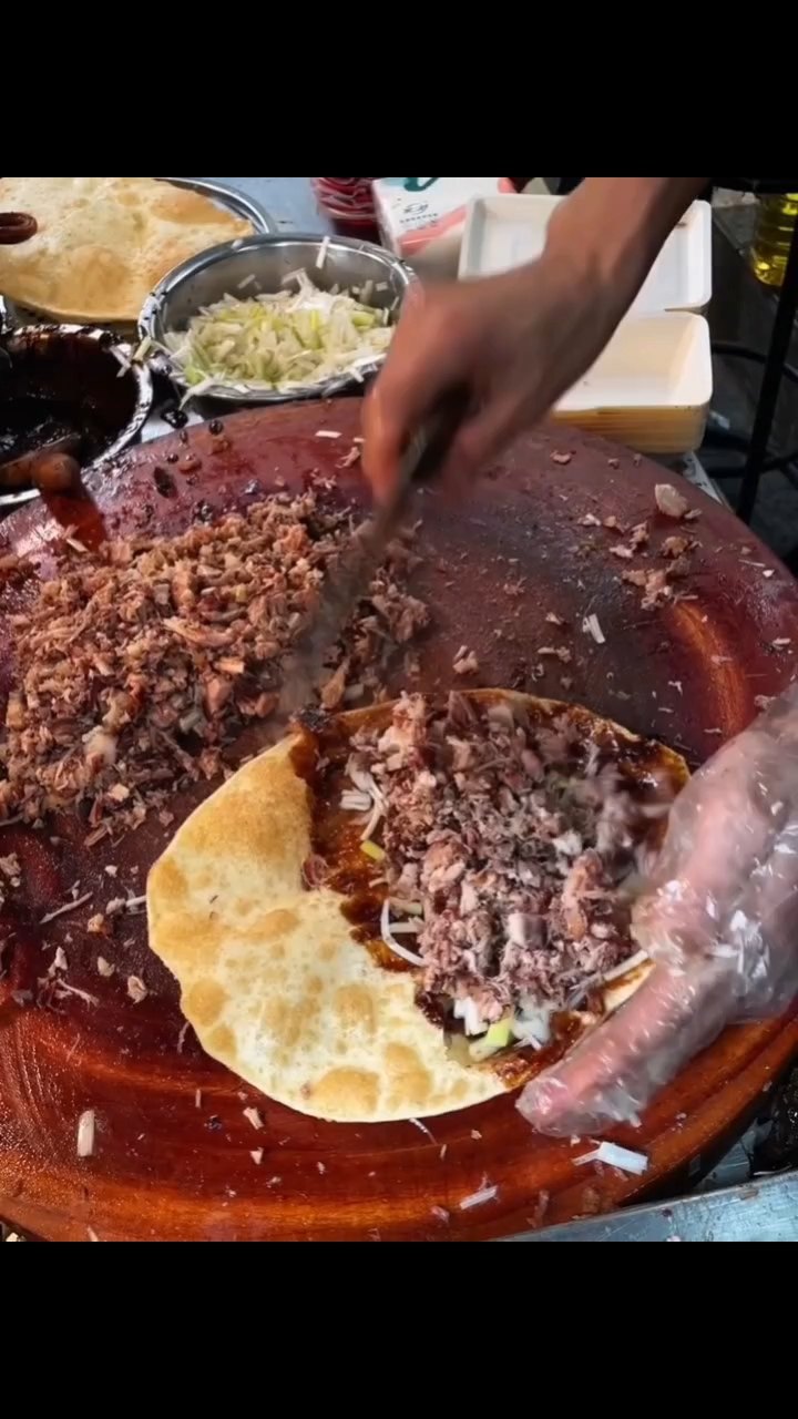 西安北郊最权威nb的熏肉大饼!