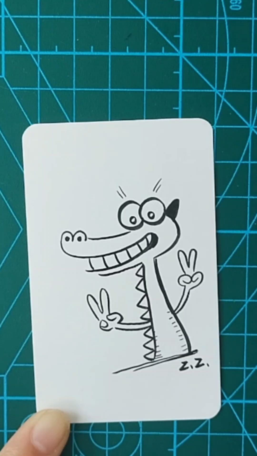 一分钟画可爱简笔画小鳄鱼!