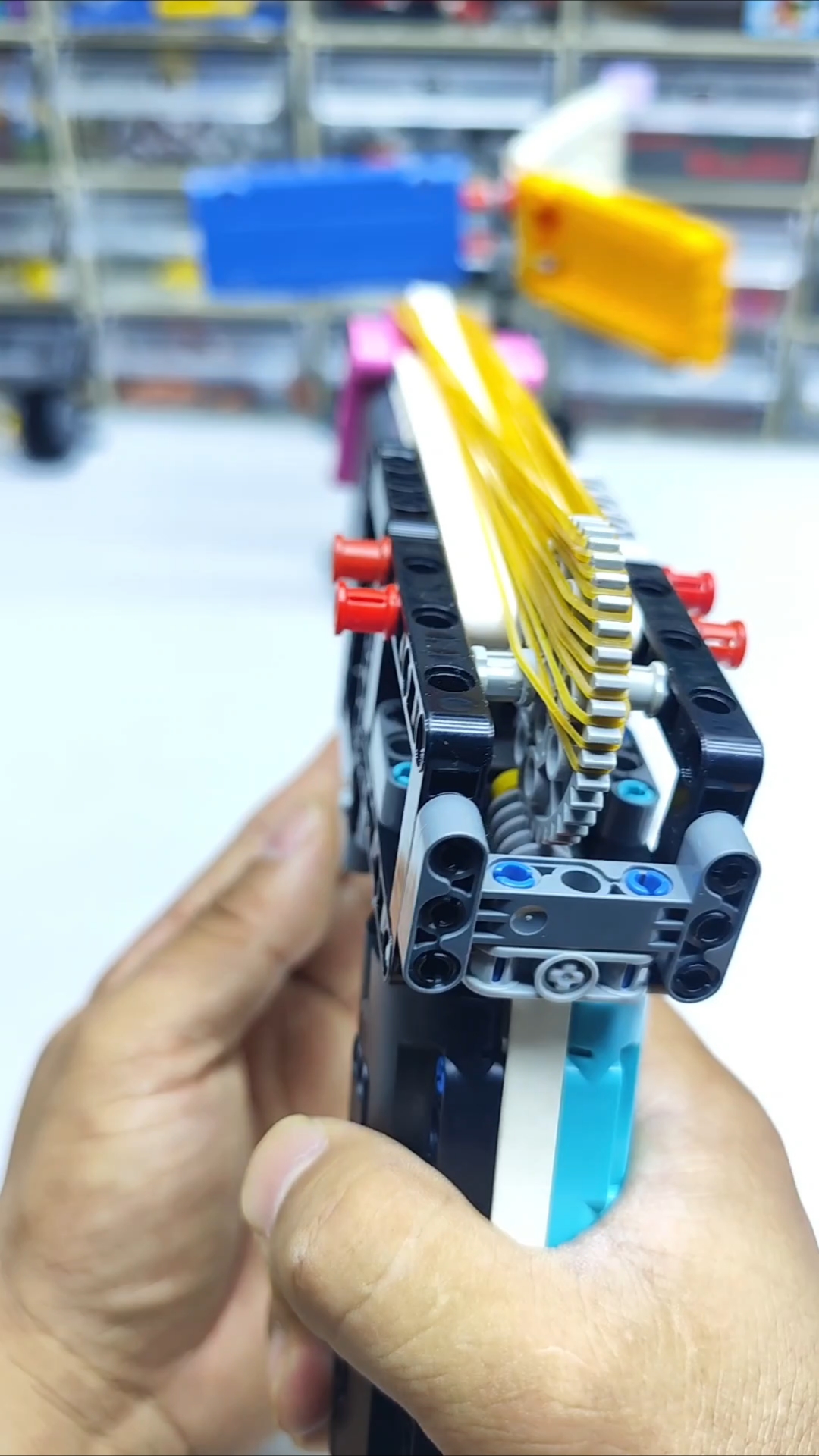 看看这把全自动的连发积木皮筋枪怎么样？