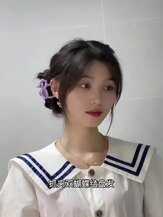 可爱双丸子头抓夹蝴蝶结盘发(可爱女孩必备发型)