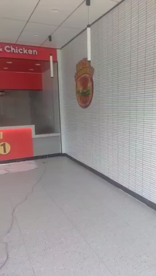 华莱士全鸡汉堡连锁店装修选用上海普隆石晶墙板