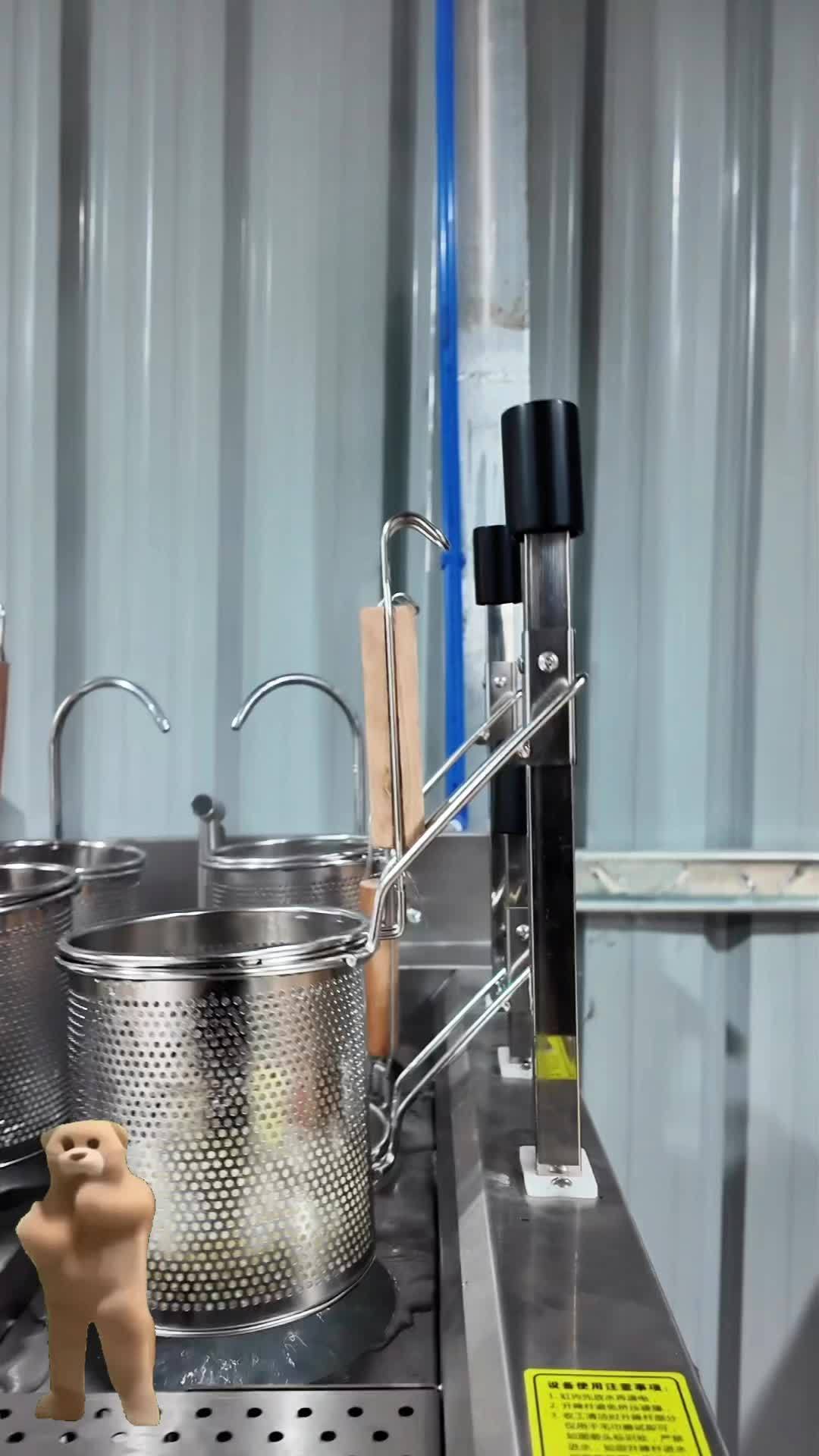 六头全自动升降煮面炉每一个升降杆可独立设置时间,两个干可独立控制开关,整机不锈钢接触石材部