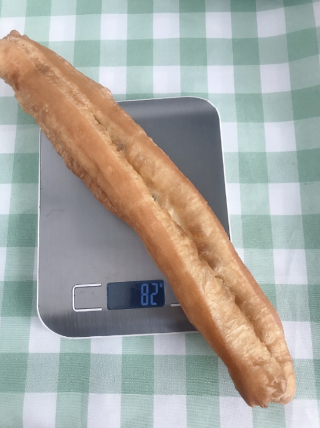 一根油条的热量,82克318大卡