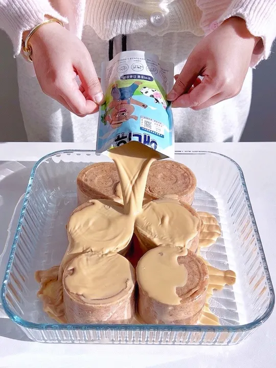 奶茶瀑布盖浇六喜海鲜丸子