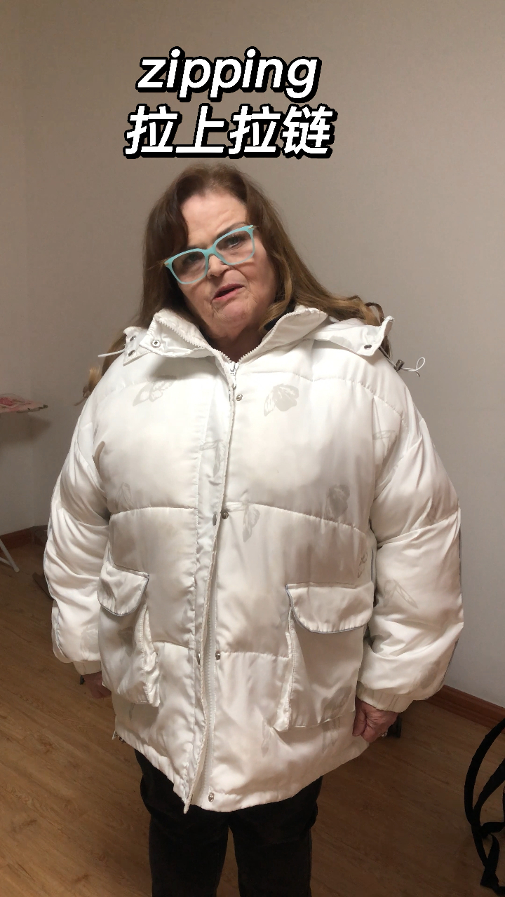 拉上拉链英文怎么说?