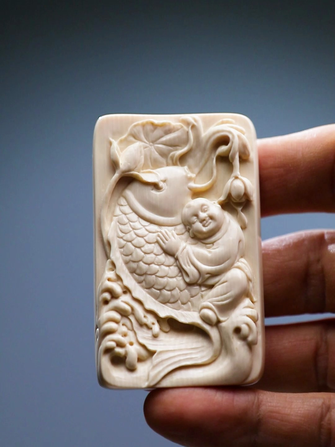 精致典雅鱼趣童缘猛犸牙吊坠