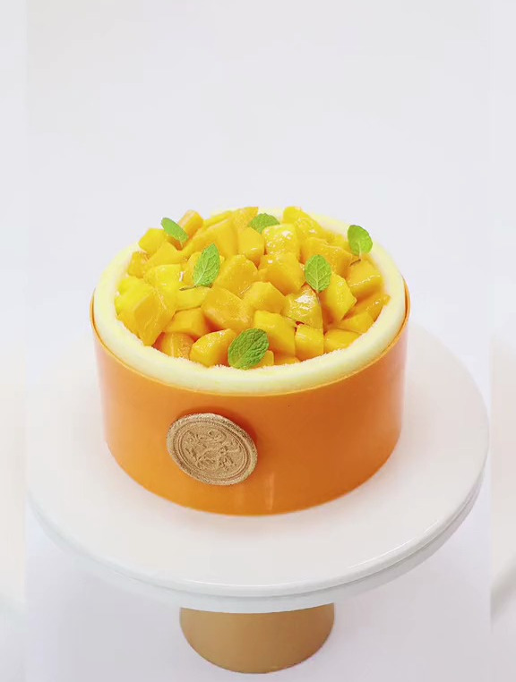 哇～今天是芒果蛋糕～法式和传统西点结合让产品更新颖