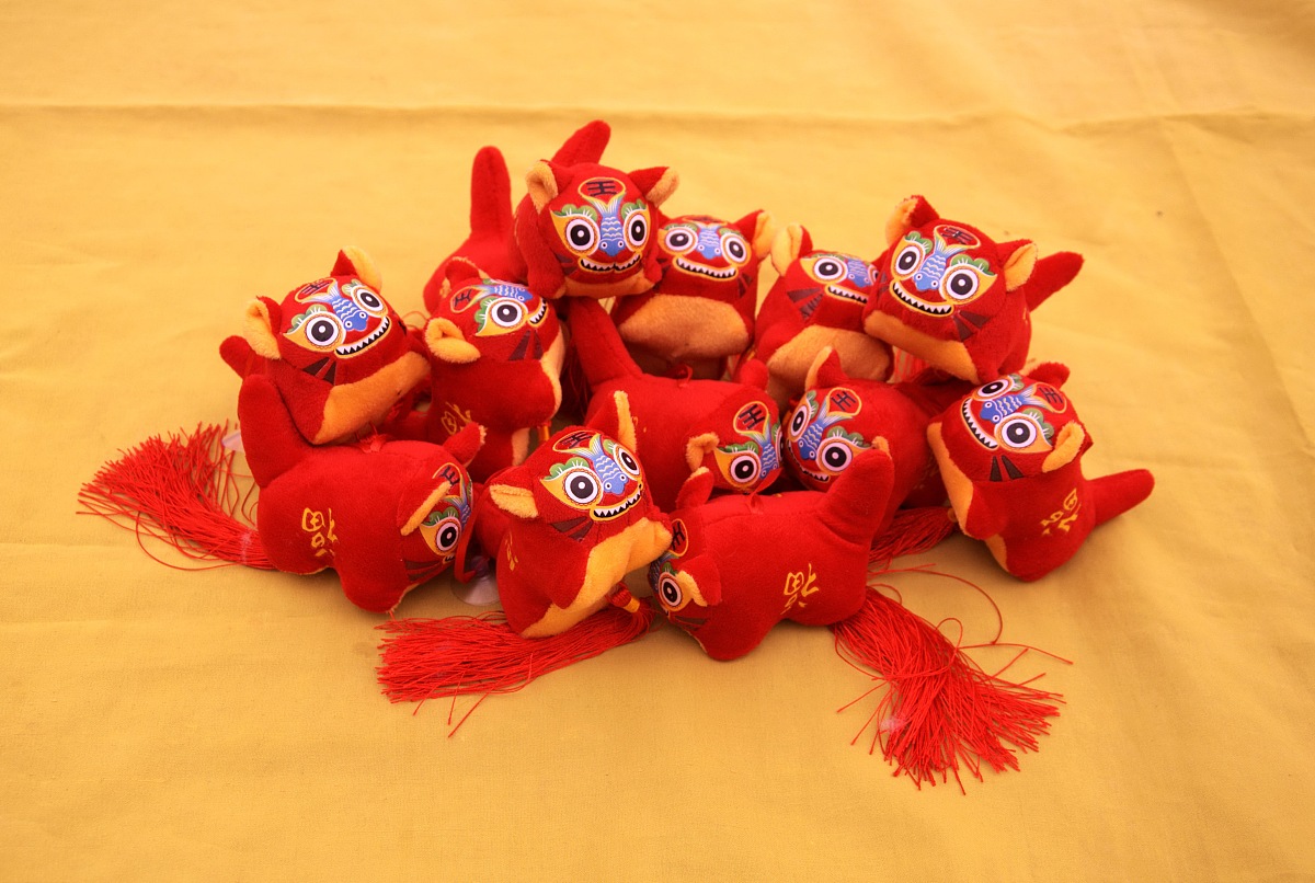 行李箱上能掛小老虎饰品吗