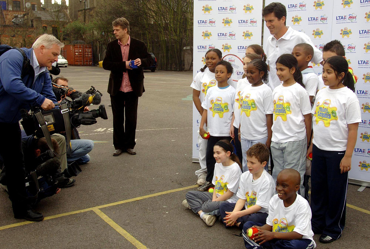 tim henman helps launch the ariel mini tennis for school's progr