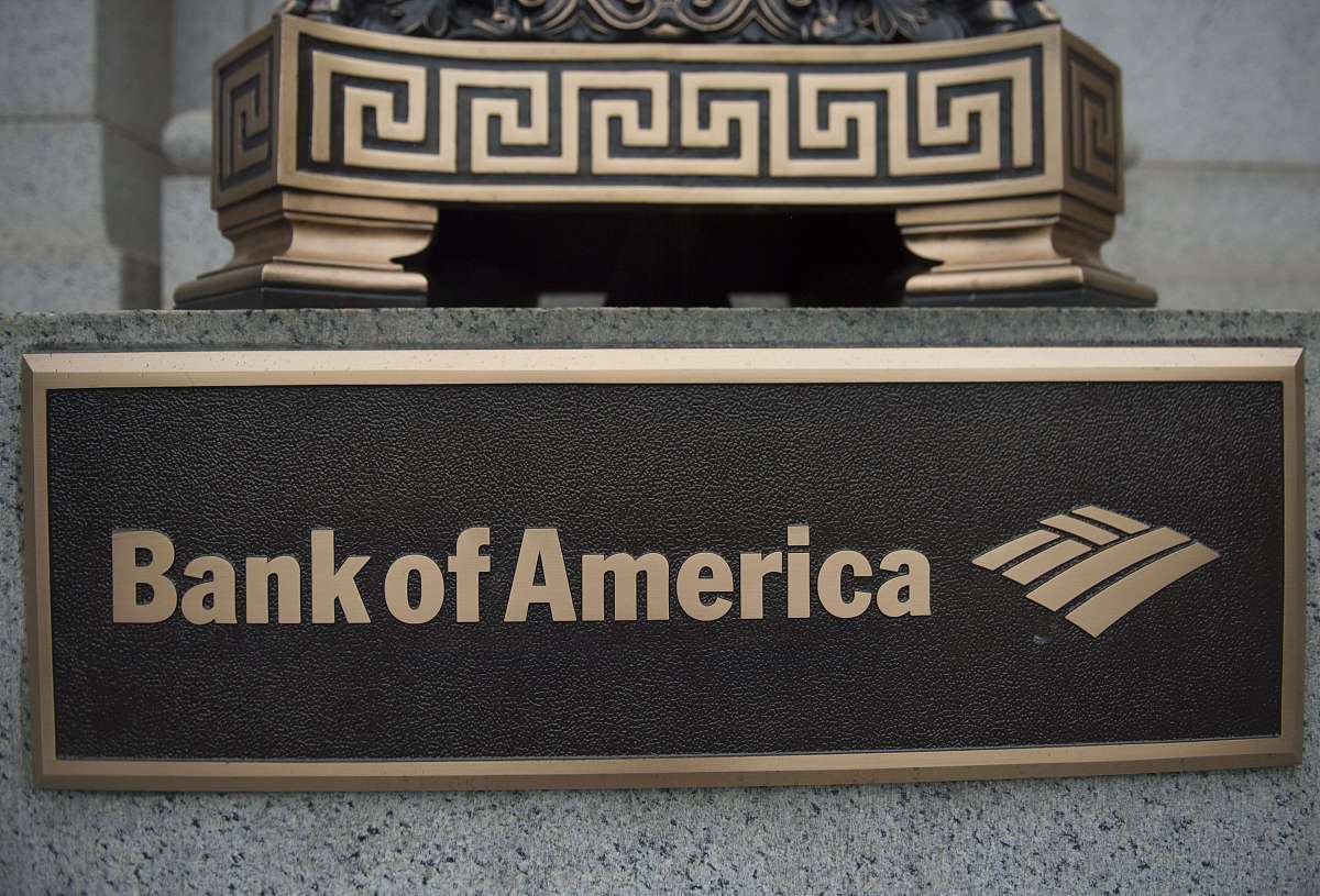 a sign stands in front of a bank of america branch in washington