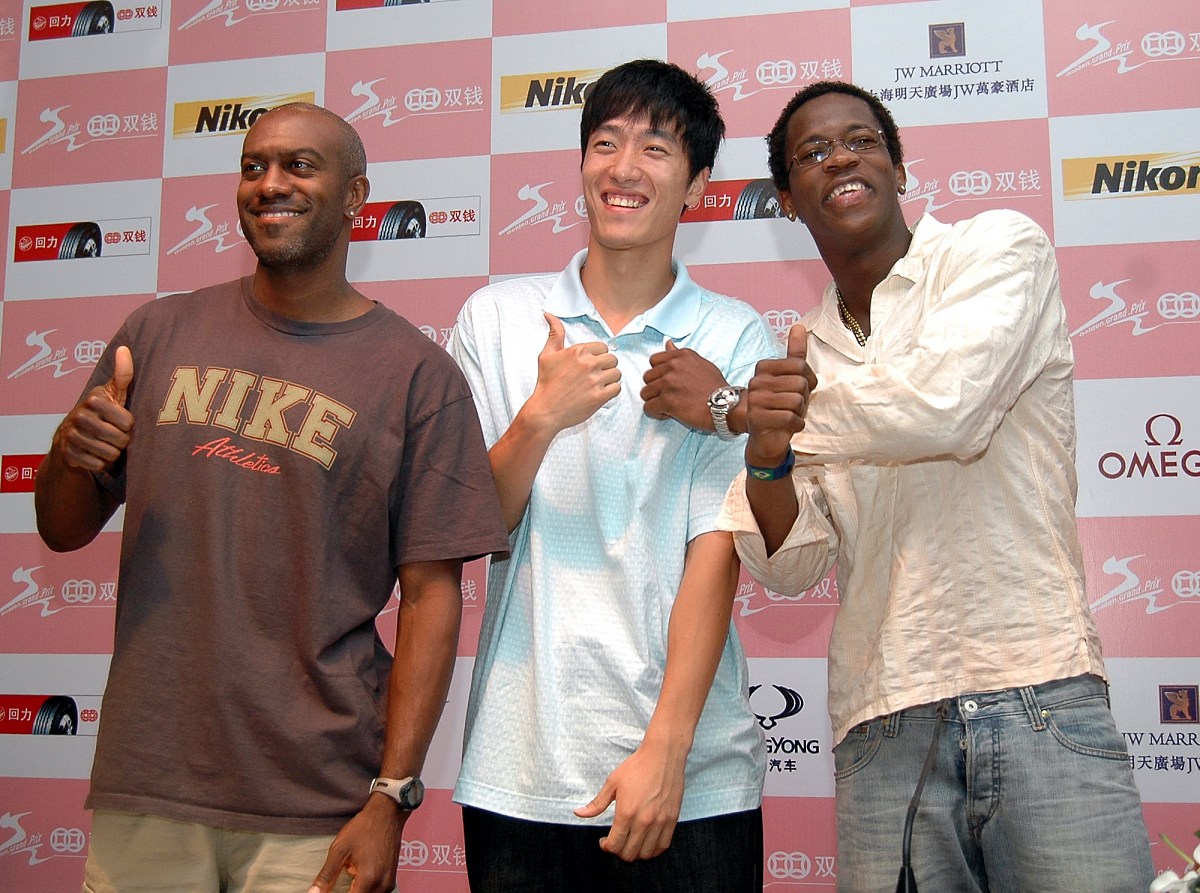 2007年9月26日,上海,刘翔,约翰逊和罗伯斯三位世界110米栏名将出席黄