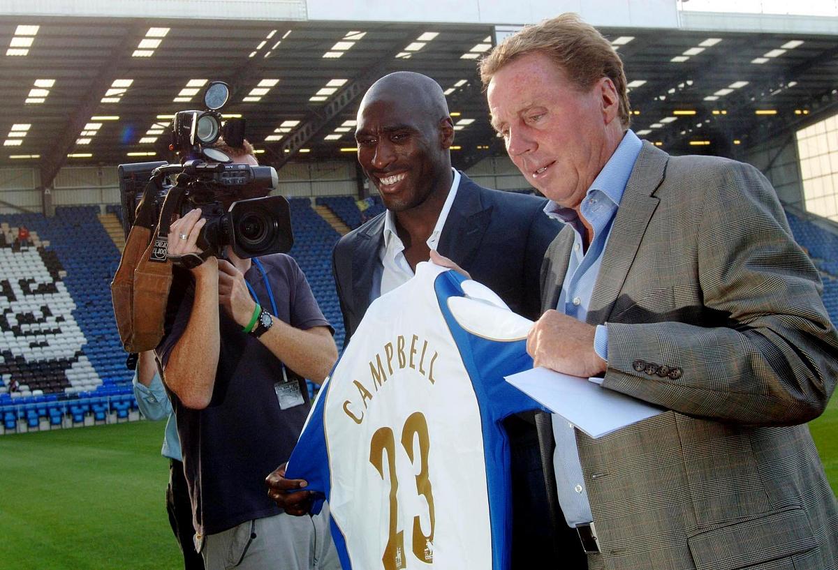 portsmouth's new signing sol campbell poses for the media with m