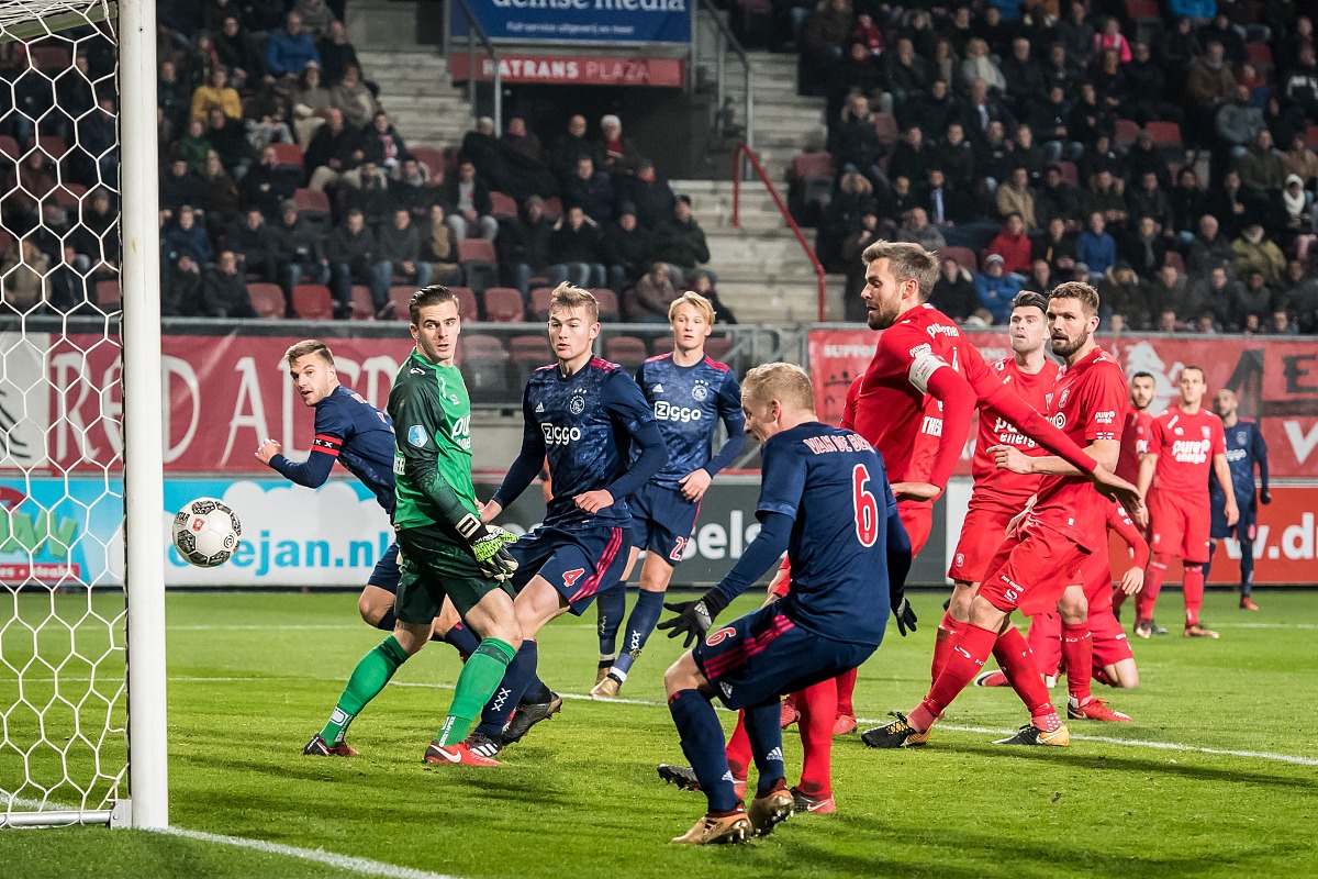 (l-r) joel veltman of ajax, goalkeeper jorn brondeel of fc twent