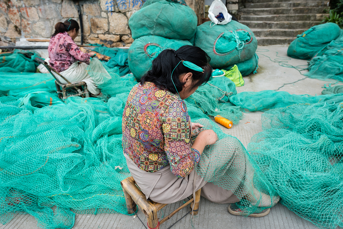 四字有关渔民织网的短语