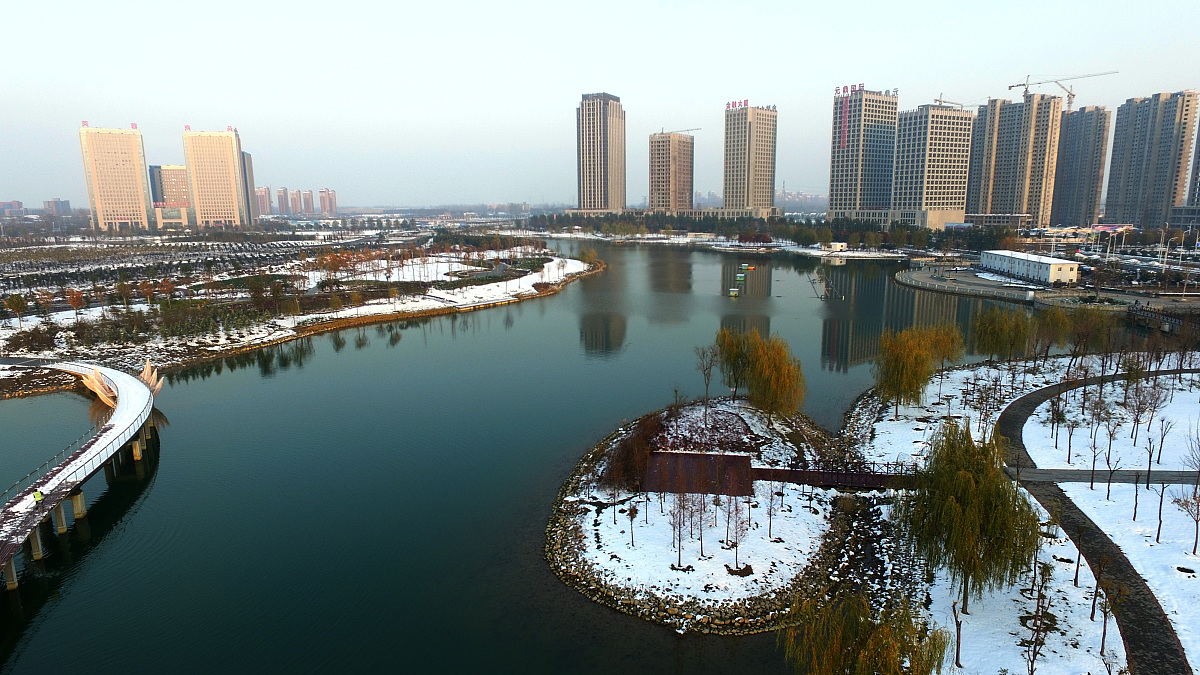 ***_***2016年11月23日,河南许昌,航拍雪后芙蓉湖银装素裹美景如画.