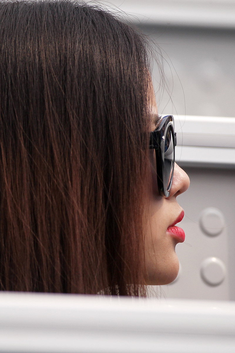 Lora Model Prompt: Black-haired Woman in Cafe with Beverage