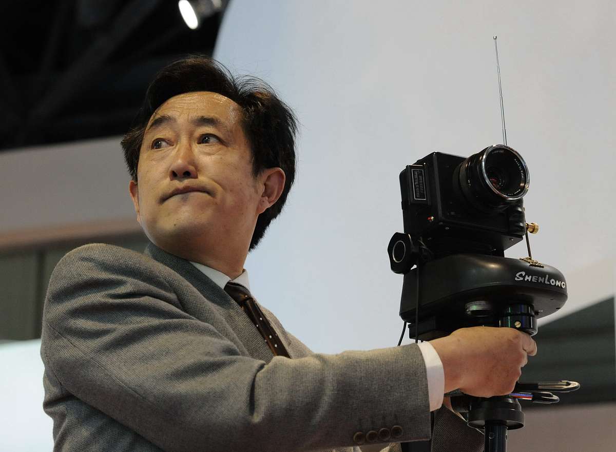 ***_***2009年3月22日,北京,神龙可俯仰取景360度旋转拍摄机发明人俞