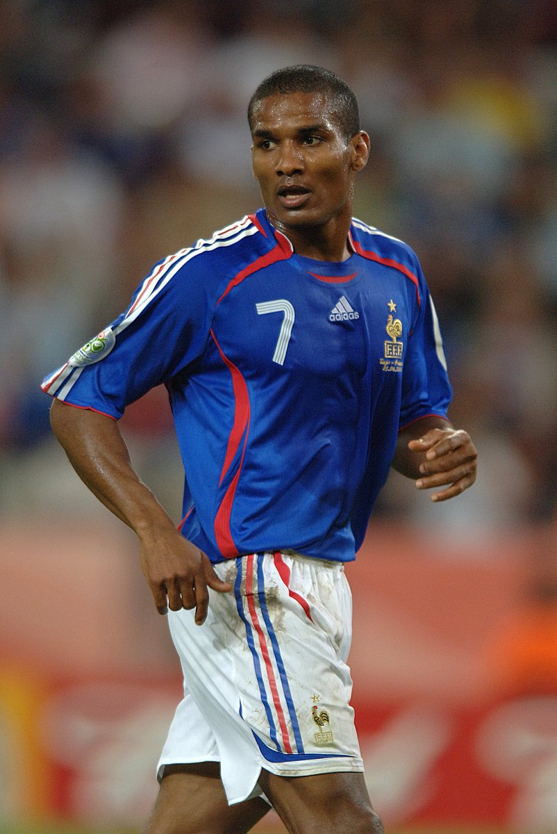 2006年6月23日,世界杯g组,法国2-0击败多哥.马卢达  florent malouda,