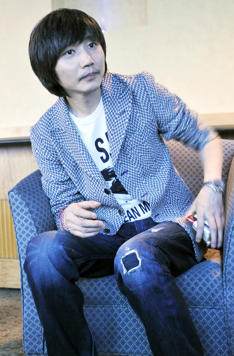 2010年5月27日,昆明,张亚东在酒店接受媒体采访.***_***张亚东+++_+++