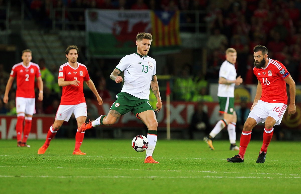 <strong>c</strong>ardiff, wales - october 09: jeff hendrick of ireland (c) passes