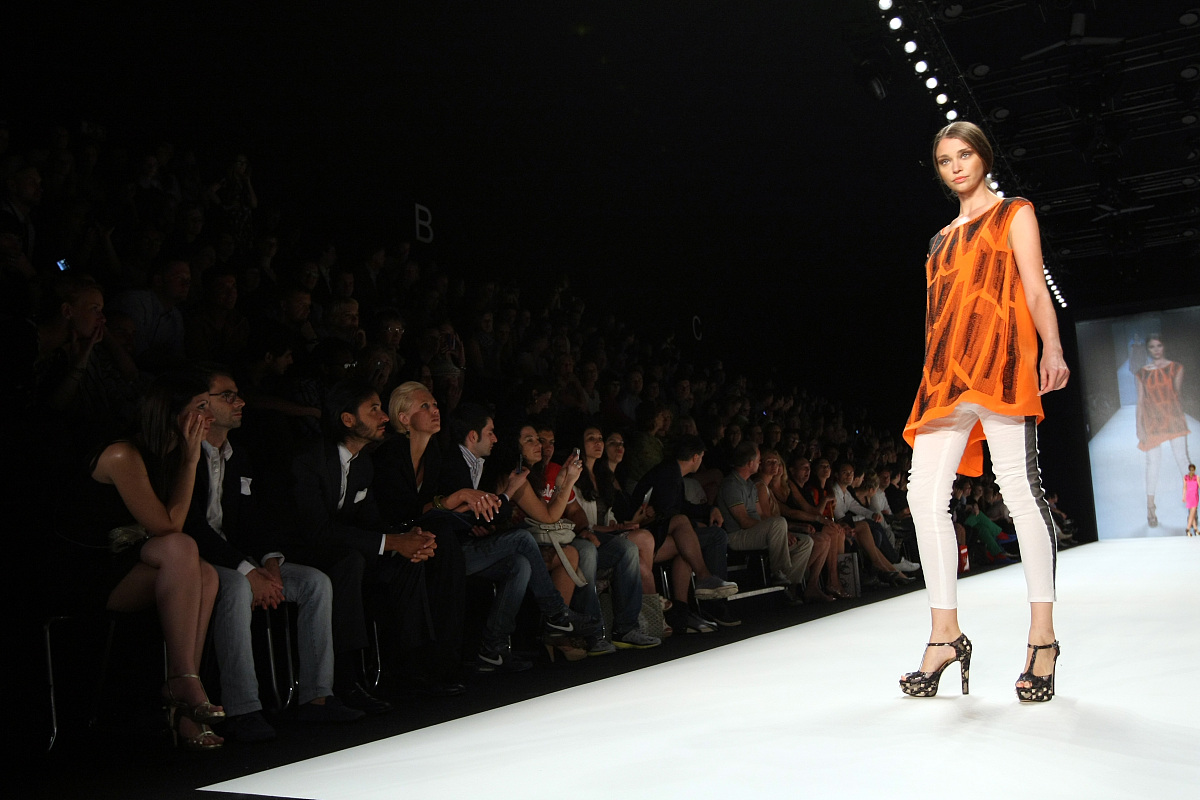 berlin, germany - july 07:  a model runs the catwalk during the 
