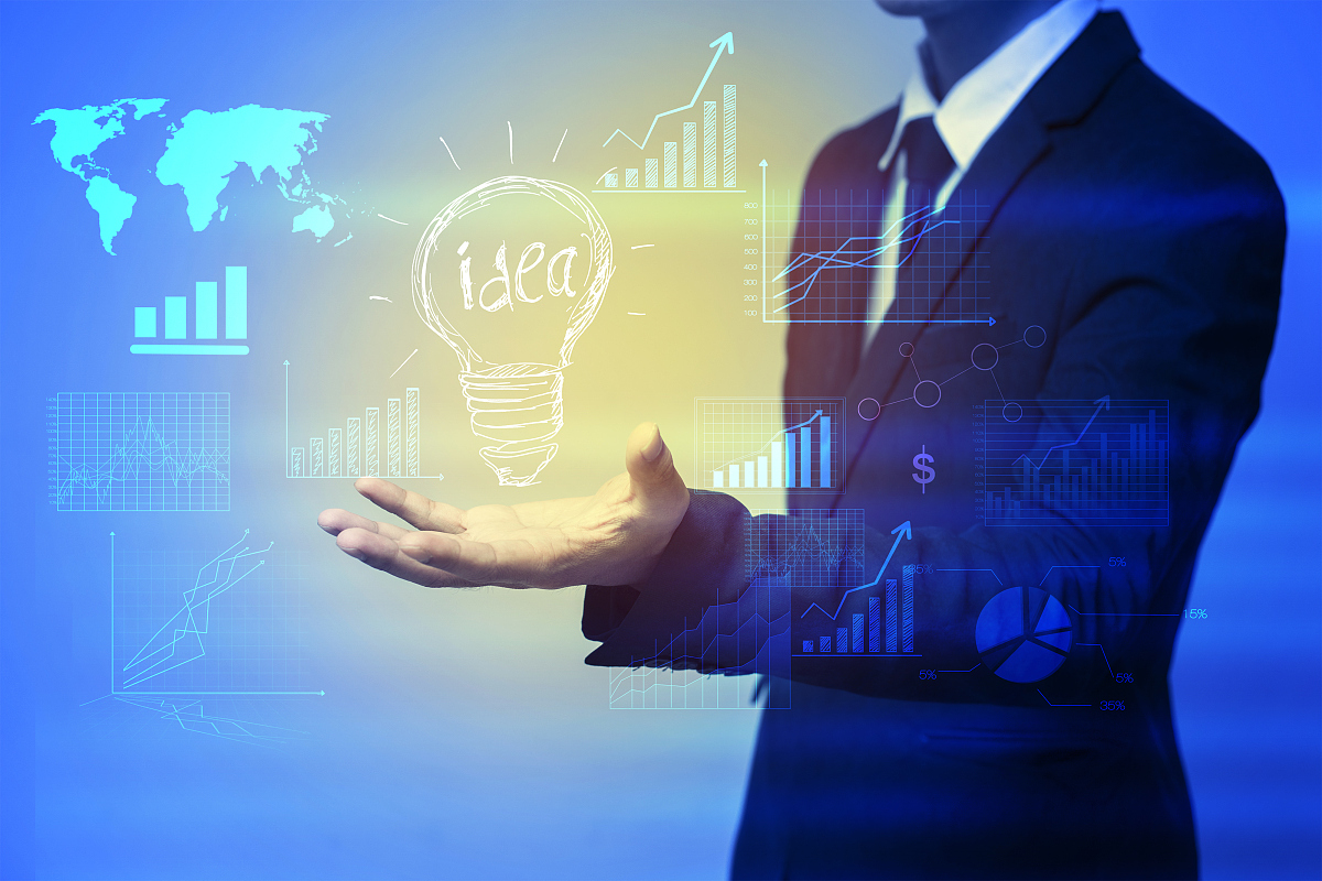 business man with idea lamp on his hand,idea concept