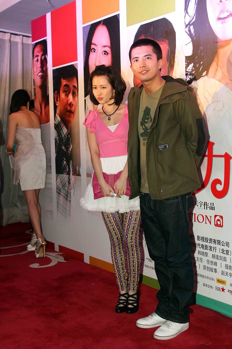 2011年3月29日,北京,电影《万有引力》首映红毯.黄幻,段博文+++_+++电