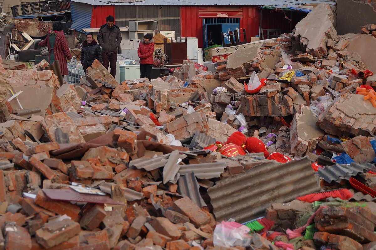 强曝光的照片_房屋被强拆后国家按什么赔偿标准