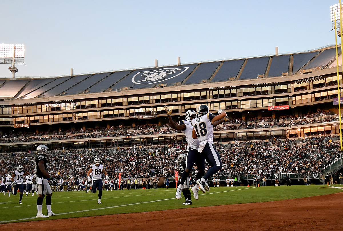 oakland, ca - august 19:  cooper kupp #18 and sammy watkins #2 o