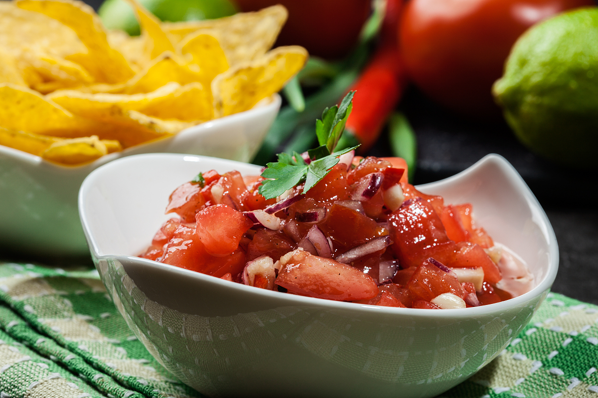 bowl of fresh salsa with tortilla chips