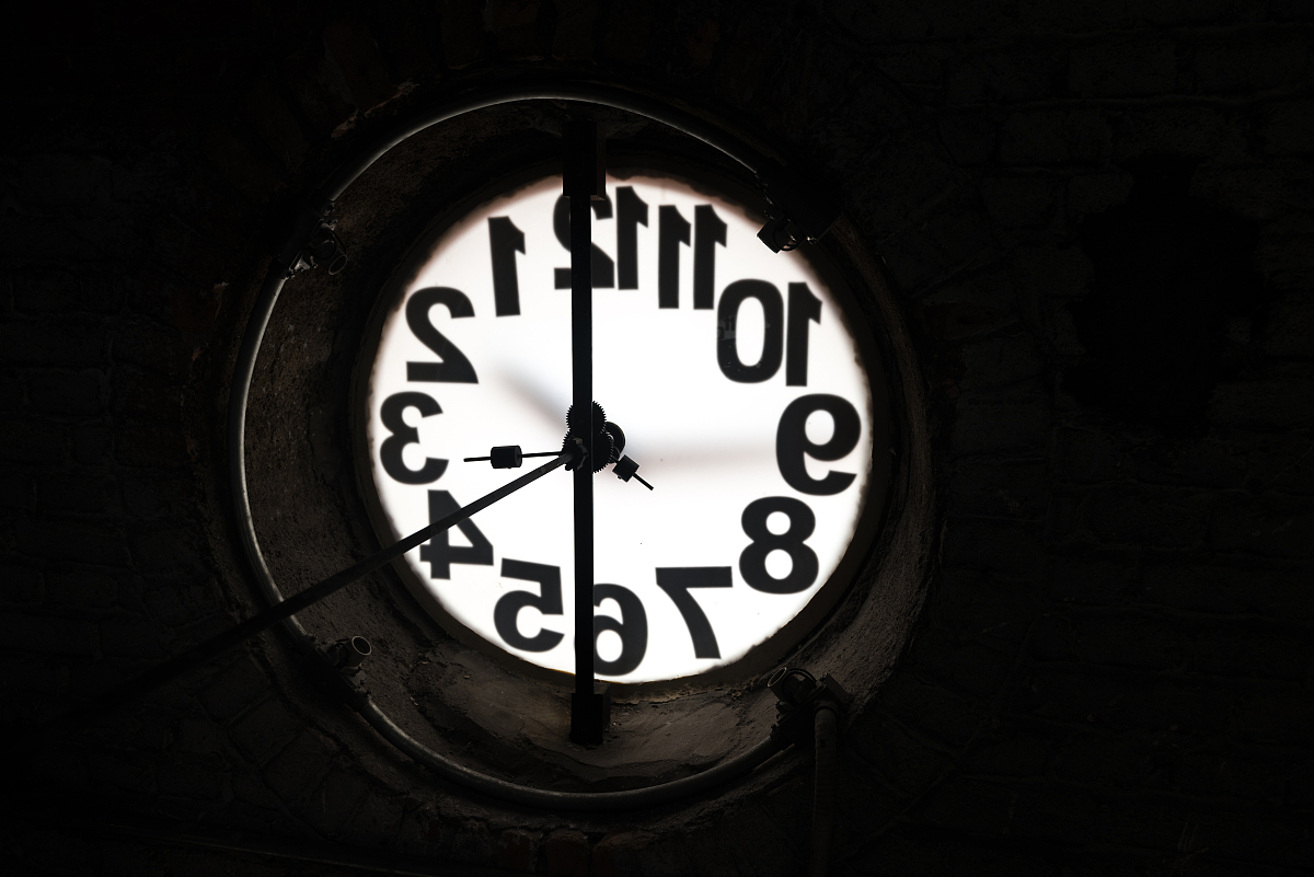 big old clock embeded on the wall