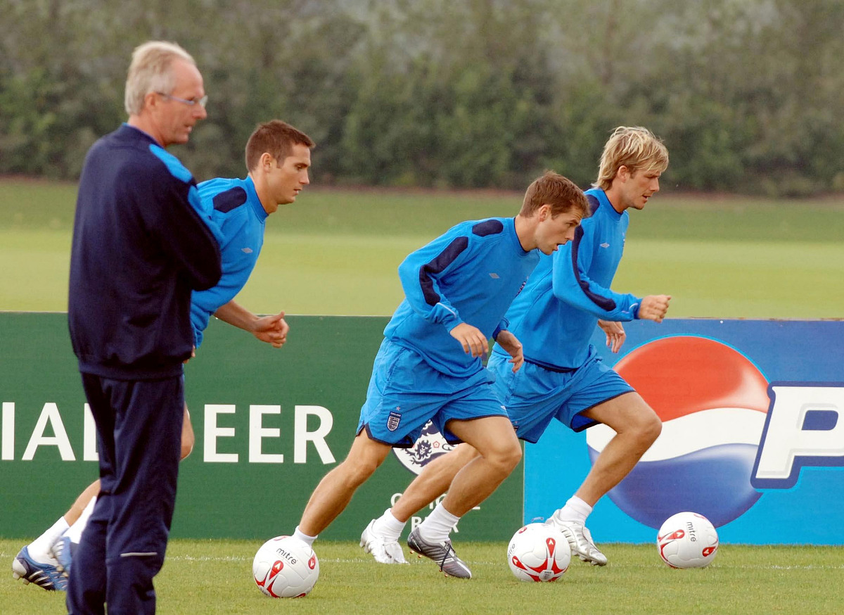 england head coach sven goran eriksson (l) watches frank lampard