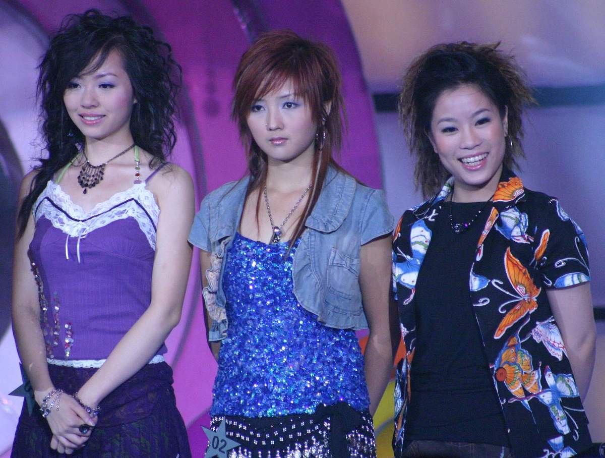 2005年7月29日,湖南长沙,超级女声决赛第三场10进8落下帷幕.张靓颖,何