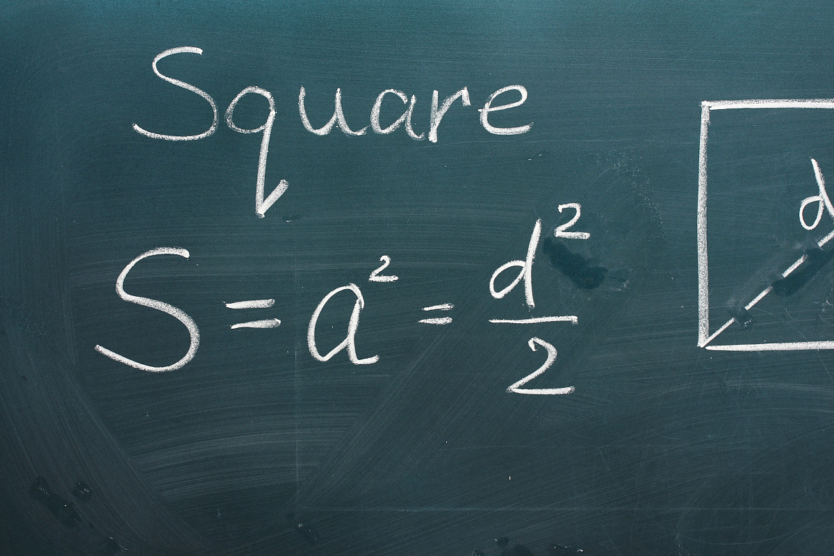 math formulas written on the desk