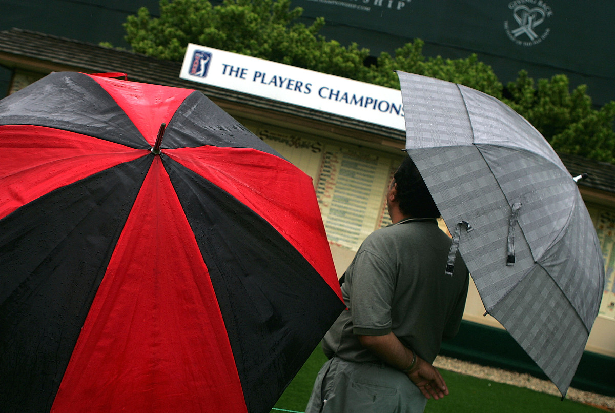 ponte vedra beach, fl - march 26:  golf fans wait near a scorebo