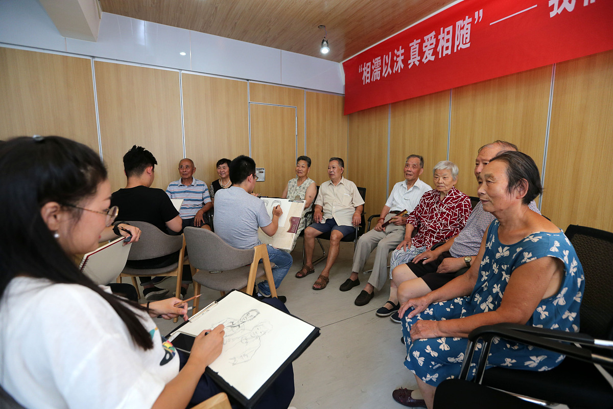 巴南区教育系统老干部2019年春节慰问座谈会在重庆市巴南职业教育中心举行