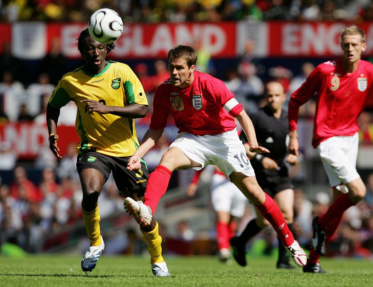 manchester, united kingdom - june 03:  michael owen (r) of engla