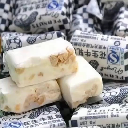 上海特产冠生园大白兔花生牛轧糖散称500克牛扎糖  https://weidia