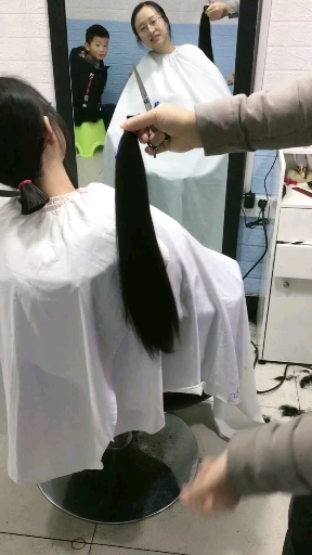 与长发飘飘无缘了